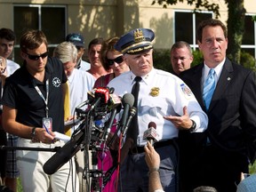 Baltimore County police chef Jim Johnson (2nd R), accompanied by Baltimore County Executive Kevin Kamenetz (R).

REUTERS/Jose Magana
