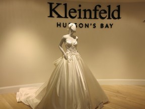 A wedding dress is displayed at the Kleinfeld bridal shop in Hudson's Bay.