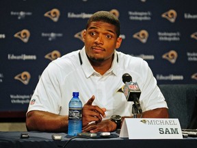 St. Louis Rams seventh round pick defensive end Michael Sam talks with the media during a press conference at Rams Park in St Louis in this file photo taken May 13, 2014. (REUTERS)