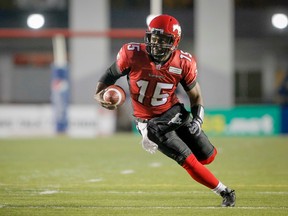 Kevin Glenn, scrambling for the Stampeders last season, will provide the B.C. Lions with seasoned quarterbacking behind Travis Lulay in 2014. (Lyle Aspinall, QMI Agency)