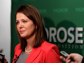 Wildrose leader Danielle Smith speaks to the media on the merger proposal from the PC Party at the Legislature Annex in Edmonton, Alberta on Wednesday, May 14, 2014.  Perry Mah/ Edmonton Sun/ QMI Agency