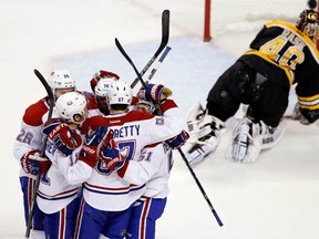 The Canadiens celebrate Max Pacioretty's (67) goal against Bruins goalie Tuukka Rask (40) during second period playoff action in Game 7 of the Eastern Conference semifinal in Boston on Wednesday, May 14, 2014. (Greg M. Cooper/USA TODAY Sports)
