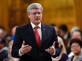 Canada's Prime Minister Stephen Harper speaks during Question Period in the House of Commons on Parliament Hill in Ottawa May 13, 2014. (REUTERS)