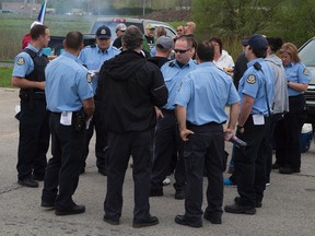 Guards held a lunchtime information picket outside Elgin Middlesex Detention Centre in London Wednesday. The guards claim the province is not bargaining their next contract in good faith. (DEREK RUTTAN, The London Free Press)