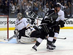 Kings defenceman Jake Muzzin (6) celebrates after scoring a goal past  Ducks goalie John Gibson (36) during first period playoff action in Game 6 of their Western Conference semifinal in Los Angeles on Wednesday, May 14, 2014. (Kirby Lee/USA TODAY Sports)