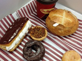 The eclair, sugar twist, pecan butter tart, chocolate sour cream glazed donut and bread bowl were the candidates for Tim Hortons Bring It Back campaign. (Meghan Mitchell/QMI Agency)