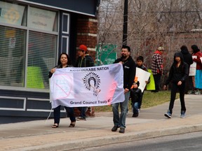 Workers from the Treaty 3 Grand Council and their supporters marched through Kenora on Wedneday, May 14, in solidarity with their chiefs in Ottawa.