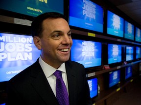 Ontario PC leader Tim Hudak held a press conference at 2001 Audio Video on Wellington Road in London, Ont. on Thursday May 15, 2014. (DEREK RUTTAN/QMI Agency)