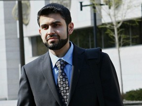 Misbahuddin Ahmed, accused terror conspirator, leaves the Ottawa Courthouse on Wednesday May 14, 2014. Errol McGihon/Ottawa Sun/QMI Agency