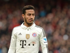 Bayern Munich's Spanish midfielder Thiago Alcantara reacts during the German first division Bundesliga football match 1 FC Nuremberg vs FC Bayern Munich in Nuremberg, southern Germany on February 8, 2014. (AFP PHOTO)