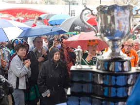 A crowd gathers to see the Memorial Cup after it was paraded through the city to Jubilee Square outside of the Covent Garden Market in London, Ontario on Thursday May 15, 2014. (CRAIG GLOVER, The London Free Press)