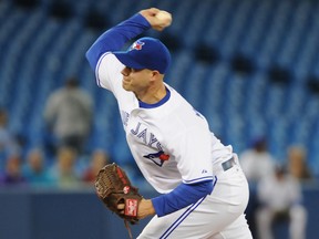 Blue Jays starting pitcher Dustin McGowan delivers a pitch against the Cleveland Indians at Rogers Centre on May 14, 2014. (DAN HAMILTON/USA TODAY Sports)