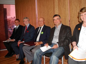 Elgin-Middlesex-London candidates pause before the taping of a televised debate in St. Thomas on Thursday. From left: PC candidate Jeff Yurek, Liberal candidate Serge Lavoie, Green Party candidate John Fisher, Freedom Party candidate Clare Maloney and NDP candidate Kathy Cornish. (Ben Forrest, Times-Journal)