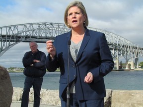 NDP Leader Andrea Horwath speaks about high electricity prices during a campaign stop Friday morning near the Bluewater Bridge in Point Edward. She also called for changes in the way Ontario develops renewable energy projects. PAUL MORDEN/ THE OBSERVER/ QMI AGENCY