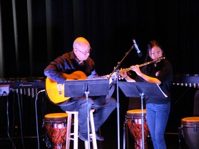 Japanese exchange student Ayaka Minato and music teacher Darcy Ura play Estudio 3 together at at St. Thomas Aquinas Secondary School’s spring concert on Thursday, May 15.
