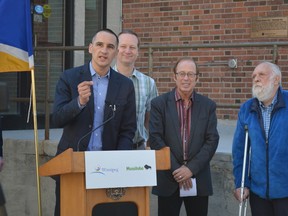 The province announced a $1.2-million contribution to Sherbook Pool Friday, May 16, 2014, which will allow the pool to re-open by 2016.  From left: Minister Kevin Chief;   MLA Rob Altemeyer; Mayor Sam Katz; Coun. Harvey Smith. (TESSA VANDERHART/Winnipeg Sun)