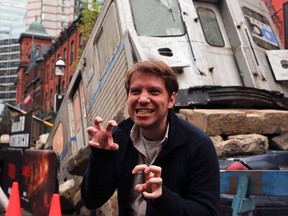 Director Gareth Edwards was on scene at the mock up of damage at Yonge St. and Elm St. in Toronto, Ont., to promote his Godzilla movie that opens in theaters on Friday on Thursday May 15, 2014. (Dave Thomas, QMI Agency)