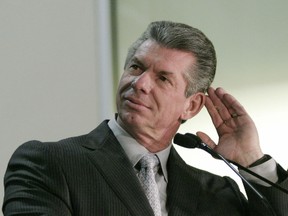 WWE CEO Vince McMahon suffered a big financial hit after losing $350 million in his company's stock value. (QMI Agency/Files)
