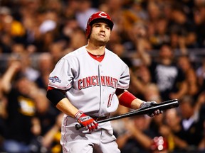 Joey Votto has a strained left quadriceps. (Jared Wickerham/Getty Images/AFP)