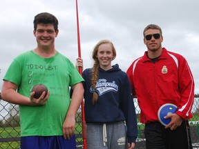 Parkside Collegiate throwers Jayson Voegtle, left, Kennady Hopkins and Noah Rolph pause during a workout behind the school on Friday. All three captured gold medals at this week's Thames Valley tri-county track and field championship. (Ben Forrest, Times-Journal)