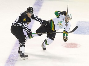 London Knights defenceman Dakota Mermis sends Val-d?Or Foreurs forward Nicolas Aube-Kubel flying as they connect mid-ice during their Memorial Cup round-robin game at Budweiser Gardens on Friday. (CRAIG GLOVER, The London Free Press)