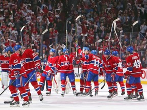 Montreal Canadiens players wave to the crowd after defeating the Boston Bruins in the game six of the second round of the 2014 Stanley Cup Playoffs at Bell Centre. 
Jean-Yves Ahern-USA TODAY Sports