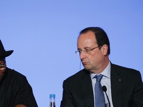 French President Francois Hollande (R) and Nigerian President Goodluck Jonathan attend a joint news conference following the African Security Summit at the Elysee Palace.

REUTERS/Gonzalo Fuentes