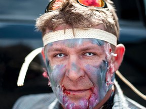 Kurt Rennet, in his best zombie attire, participated in the Hillmond Zombie Mud Run as a zombie.