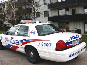 Toronto Police are investigating a possible abduction after a man who was reported missing from East York Friday was found at a lowrise apartment building in North York on Saturday. Officers spent the day guarding the unit at 3250 Keele St. where the man was located. (CHRIS DOUCETTE/Toronto Sun)