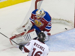 Guelph Storm forward Kerby Rychel puts the puck past Edmonton Oil Kings goaltender Tristan Jarry to score a goal during their 2014 Memorial Cup round robin hockey game at Budweiser Gardens in London, Ontario on Saturday May 17, 2014.
CRAIG GLOVER The London Free Press / QMI AGENCY