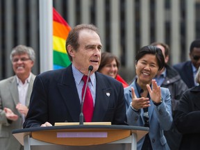 Toronto Deputy Mayor Norm Kelly, joined by city councillors - speaks during the annual Pride flag raising ceremony at City Hall on Friday. (ERNEST DOROSZUK/Toronto Sun)