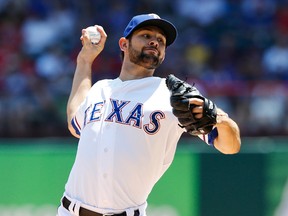 Texas Rangers starting pitcher Nick Martinez (22) throws during the third  inning against the Toronto Blue Jays at Globe Life Park in Arlington. (Kevin Jairaj-USA TODAY Sports)