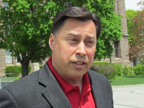 Liberal MPP Brad Duguid says the Progressive Conservative plan for solar and wind energy could end up wasting billions of dollars, outside Queen's Park on Sunday, May 18, 2014. (Antonella Artuso/Toronto Sun)