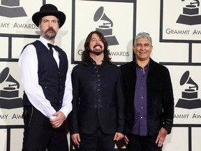 Musicians Chris Shiflett (L), Dave Grohl and Pat Smear of the group Foo Fighters.

REUTERS/Danny Moloshok