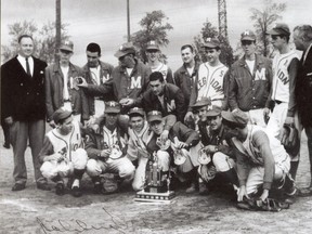 Members of the 1964 Mactier Legion Flyers fastball team pose with their OASA championship trophy. The team, which included Sudburians Paul Simpson and Bill Pandke, as well as hockey legend Bobby Orr, will be inducted into the Bobby Orr Hall of Fame in Parry Sound on June 28.