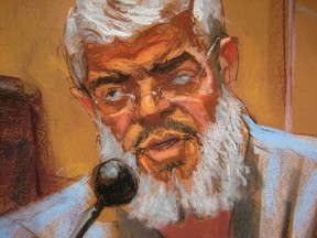 Abu Hamza al-Masri, the radical Islamist cleric facing U.S. terrorism charges, replies to questions from his defense lawyer Joshua Dratel (unseen) in Manhattan federal court in New York in this artist's sketch May 12, 2014. (REUTERS/Jane Rosenberg)