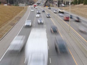 Cars and trucks head over the Rainbow Valley Bridge in Edmonton. Ian Kucerak/Edmonton Sun/QMI Agency