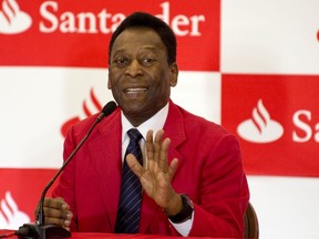 Pele speaks during a press conference in Huixquilucan, Mexico on May 19, 2014. (AFP PHOTO/Alfredo ESTRELLA)