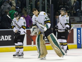 London Knights forward Mitch Marner, left, goaltender Anthony Stolarz and forward Bo Horvat skate off the ice after losing 5-2 to the Edmonton Oil Kings during their 2014 Memorial Cup round robin hockey game at Budweiser Gardens in London, Ontario on Sunday May 18, 2014. (CRAIG GLOVER, The London Free Press)