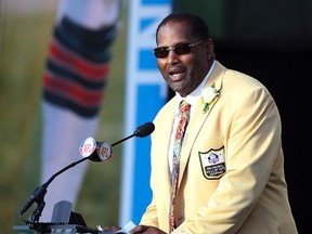 Defensive end Richard Dent, who played the bulk of his career with the Chicago Bears, delivers his acceptance speech during his induction into the NFL Pro Football Hall of Fame in Canton, Ohio August 6, 2011. (REUTERS/Aaron Josefczk)
