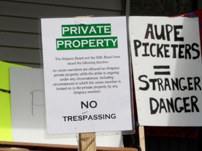 A sign outside the Artspace Housing Co-operative Ltd., 9330 - 101A Ave., in Edmonton Alta., on Friday May 16, 2014. The coop was the scene of a recent strike by AUPE care aides. When the strike was ended residents of the coop locked out the care aides. David Bloom/Edmonton Sun