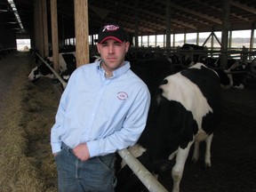 Kevin Forbes is shown in this file photo at Forbesvue Farms in Sarnia, where Breakfast on the Farm 2014 is set to be held June 14. The breakfast, along with a tour of the dairy farm and other activities, is being organized by several groups to celebrate the role agriculture plans in the local economy. (File photo)