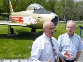 Local MP Rick Norlock and National Air Force Museum of Canada director Chris Colton discuss the restoration project of the F-86 Sabre on display at the museum's air park on Tuesday, May 20, 2014 in Trenton, Ont.. The museum has received $25,000 in funding from the New Horizons for Seniors Program. 
Ernst Kuglin/Trentonian/The Intelligencer