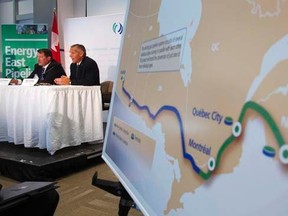 TransCanada President and CEO Russ Girling (2nd L) announces the new Energy East Pipeline during a news conference in Calgary, Alberta, August 1, 2013.  REUTERS/Todd Korol