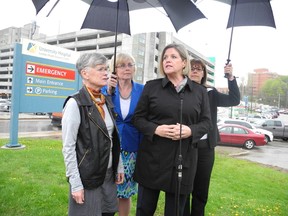 NDP Leader Andrea Horwath, front, right, visits University Hospital on Tuesday, the second time she has visited the riding of Liberal Health Minister Deb Matthews in recent days. (Jonathan Sher, The London Free Press)