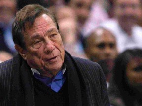 Los Angeles Clippers owner Donald Sterling watches the team play New York Knicks in their NBA basketball game in Los Angeles in this February 11, 2009 file photograph. (REUTERS/Lucy Nicholson/Files)