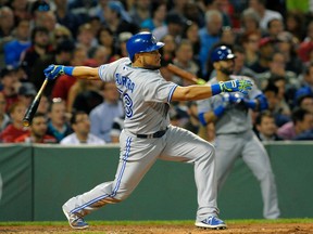 Toronto Blue Jays left fielder Melky Cabrera (53) hits an RBI double during the fifth inning against the Boston Red Sox at Fenway Park. (Bob DeChiara-USA TODAY Sports)