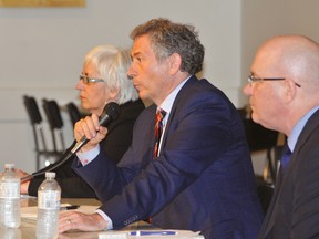 Leeds-Grenville provincial election candidates participate in an all-candidates meeting in this Recorder and Times file photo. From left are Liberal Party candidate Christine Milks, New Democratic Party candidate David Lundy and Progressive Conservative candidate Steve Clark.