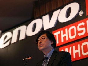 Lenovo chairman and chief executive officer Yang Yuanqing speaks during a news conference announcing the company's annual results in Hong Kong May 21, 2014. REUTERS/Bobby Yip