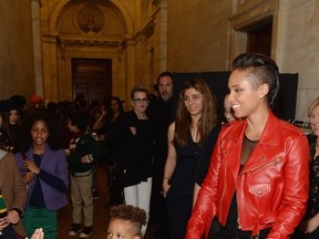 Alicia Keys and her son Egypt Dean attend the Ralph Lauren Fall 14 Children's Fashion Show in Support of Literacy at New York Public Library on May 19, 2014 in New York City.  (Jamie McCarthy/Getty Images for Ralph Lauren/AFP)